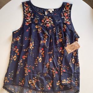 NWT floral sleeveless top.